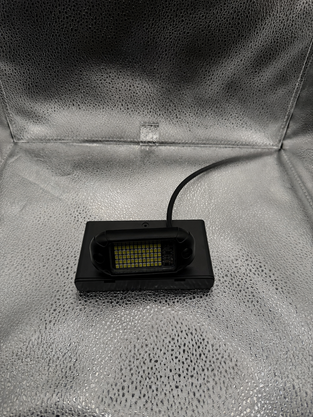 Battery powered rock light
