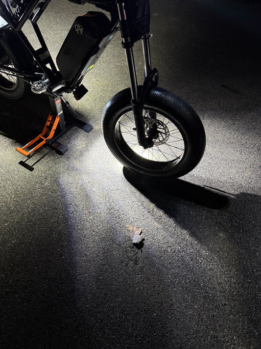 Battery powered wheelie light